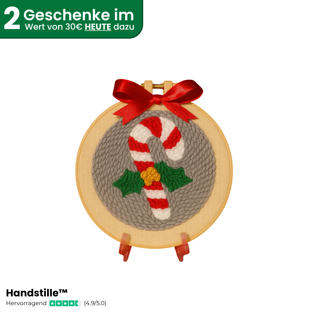 Punch Needle Weihnachtsmotiv mit Zuckerstange und roter Schleife im Stickrahmen, Text: ‚2 Geschenke im Wert von 30 € heute dazu‘, Handstille Punch Needle Set mit Gratisgeschenken, ideal als DIY Weihnachtsdeko oder Geschenkidee.